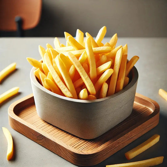 Crispy thin-cut fries, golden and lightly salted, served in a rustic container for a classic and timeless snack